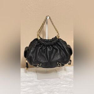 Cole Haan Black Pebbled Leather handbag  with Gold Chain Handles